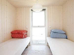 Ένα ή περισσότερα κρεβάτια σε δωμάτιο στο Bright Beach House Retreat - By Traum Ferienwohnungen