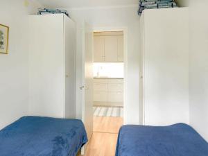 Кровать или кровати в номере Two-Bedroom Holiday home in Frändefors 1