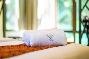 Postel nebo postele na pokoji v ubytování Cinta Abadi Resort