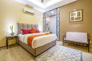 Ένα ή περισσότερα κρεβάτια σε δωμάτιο στο Cinta Abadi Resort