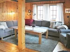 Posezení v ubytování 11 person holiday home in Edland