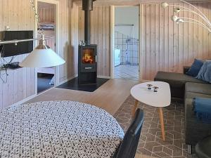 A seating area at 6 person holiday home in Ansager