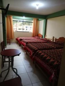 Posezení v ubytování Artesonraju Hostel Huaraz