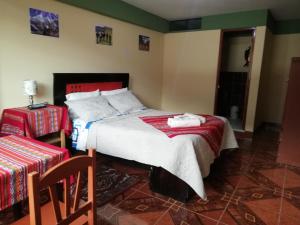 Postel nebo postele na pokoji v ubytování Artesonraju Hostel Huaraz