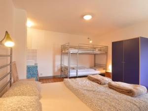 Voodi või voodid majutusasutuse Family Escape in Heppenbach toas