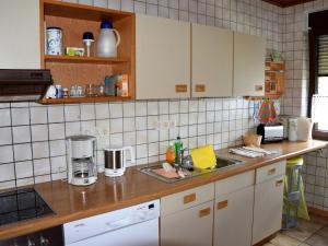 a kitchen with a sink and a counter top at Attractive Holiday Home in Rotenburg with Garden in Dankerode