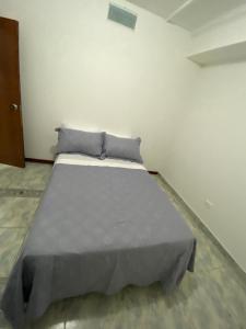 Cama o camas de una habitación en Casa Hotel Santa Ana Cedritos
