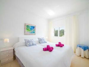 Ein Bett oder Betten in einem Zimmer der Unterkunft Apartment in Alcúdia with Bay of Pollensa View