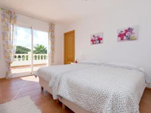 Posteľ alebo postele v izbe v ubytovaní Villa in Moraira near El Portet Beach