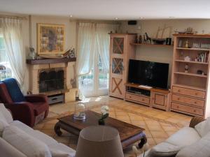 Telewizja i/lub zestaw kina domowego w obiekcie Stylish Alfàs del Pi Stay