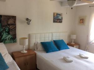 Łóżko lub łóżka w pokoju w obiekcie Stylish Alfàs del Pi Stay
