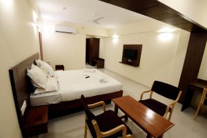 Hotel BMS客房内的一张或多张床位