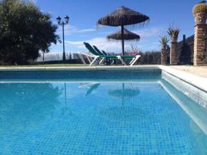 Swimmingpoolen hos eller tæt på Belvilla by OYO Villa Antisa