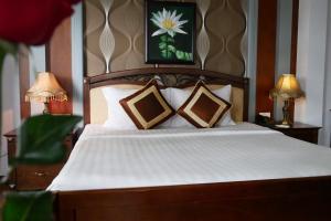 Rembrandt Hotel Nha Trangにあるベッド