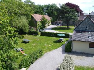 an aerial view of a backyard with a picnic table at Holiday home with private garden in Wierre Effroy in Rinxent