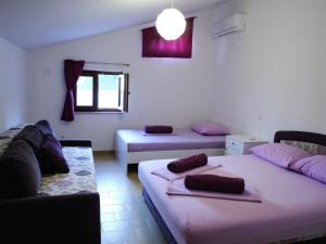 Postel nebo postele na pokoji v ubytování Holiday Home in Starigrad by the Beach