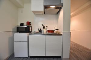 Köök või kööginurk majutusasutuses Residence Condominium KALAHAAI