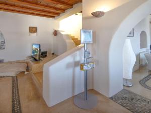 A television and/or entertainment centre at Villa in Mykonos near Agios Sostis Beach
