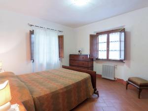 A bed or beds in a room at Holiday Home Rosignano near the Sea