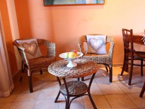 A seating area at Farmhouse in Montalto near the Beach