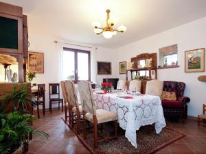 A television and/or entertainment centre at Holiday Home in Vezzi Portio with Pool