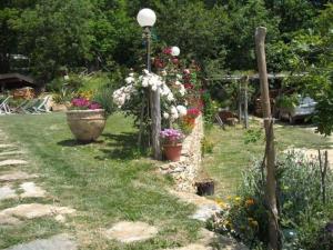 A garden outside Holiday Home in Vezzi Portio with Pool
