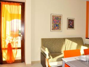 A seating area at Holiday Home in Lazise near Lake Garda
