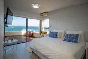 Postel nebo postele na pokoji v ubytování 61 Lazy Lizard + 35 fotografií