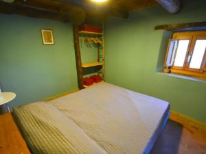 
Letto o letti in una camera di Hill-View Holiday Home in Bagni di Lucca with Terrace & Garden
