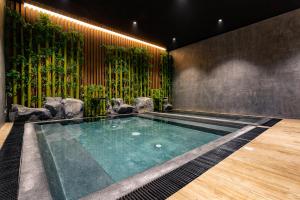 Bazén v ubytování The Gems Mining Pool Villas Pattaya nebo v jeho okolí