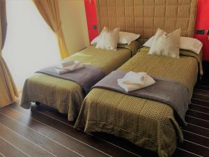 Posteľ alebo postele v izbe v ubytovaní Hotel Nordend