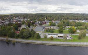 an aerial view of a town next to the water at Hotel Tingsryd in Tingsryd