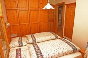Cama o camas de una habitación en Appartamenti Loega