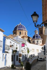 a building with two domes on top of it at Hostal Fornet Altea in Altea