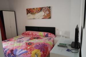 Ein Bett oder Betten in einem Zimmer der Unterkunft Hostal Fornet Altea