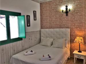 Posteľ alebo postele v izbe v ubytovaní Casa vacacional Buganvilla