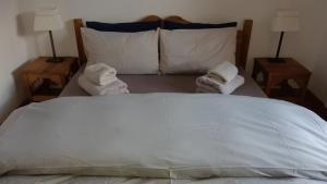 A bed or beds in a room at Chalet Apartment Monêtier