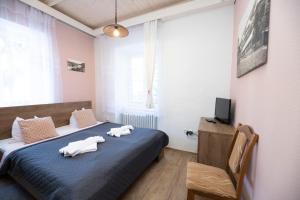 Posteľ alebo postele v izbe v ubytovaní Hotel Džbán
