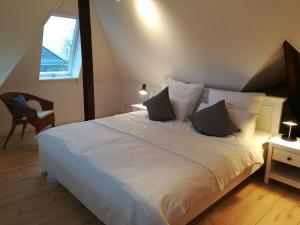 Katil atau katil-katil dalam bilik di Ferienwohnung Fischerstieg +34 gambar
