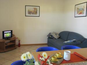A television and/or entertainment centre at Villaggio Ducale 012