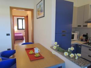 A kitchen or kitchenette at Villaggio Ducale 012