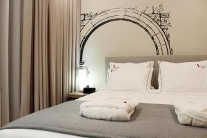 Cama ou camas em um quarto em Casa da Torre - Viseu