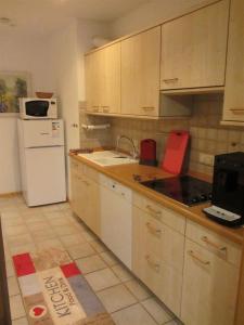 A cozinha ou cozinha compacta de Appartement Hildegard