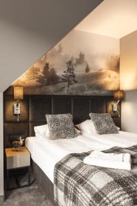 Posteľ alebo postele v izbe v ubytovaní Apartament Giewont House & Spa z Sauną Zakopane