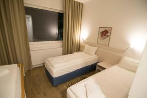 Postel nebo postele na pokoji v ubytování Staza Resort