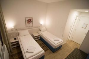 Postel nebo postele na pokoji v ubytování Staza Resort