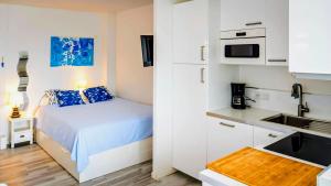 Η κουζίνα ή μικρή κουζίνα στο Appartement - Les Pieds Dans L'Eau +23 φωτογραφίες
