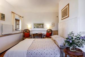 A bed or beds in a room at Agriturismo Apparita