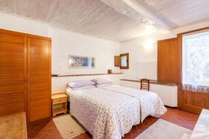 A bed or beds in a room at Agriturismo Apparita