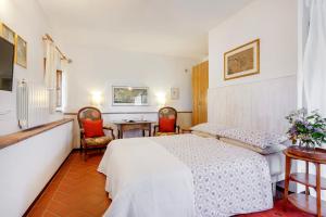 A bed or beds in a room at Agriturismo Apparita